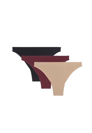 Tre perizoma senza cuciture in beige, borgogna e nero, disposti sovrapposti su sfondo bianco.
