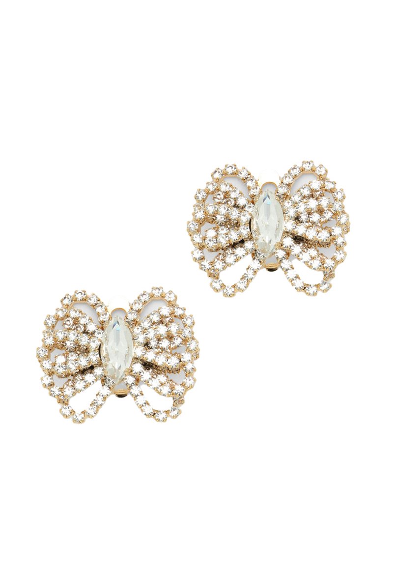 Zelta tonēti auskari, kas veidoti tauriņu formā, ar caurspīdīgiem rhinestones un centrālu ovālu dārgakmeni. Ietver sarežģītu detaļu un teksturētu dizaina elementus.