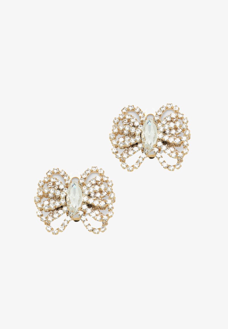 Guldtonade örhängen i form av fjärilar med klara rhinestones och en central oval ädelsten. Inkluderar intrikata detaljer och strukturerade designelement.