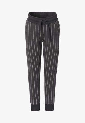 Pantalon de jogging noir avec des rayures verticales blanches, taille élastique, cordon de serrage, poches latérales et bord-côtes aux chevilles.