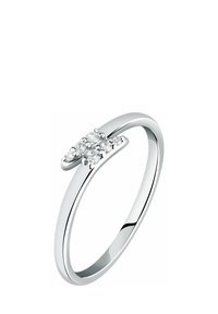 Silberring mit einem glatten, polierten Band. Verfügt über eine Gruppe kleiner, runder klarer Steine in einer Akzentfassung. Minimalistisches Design.
