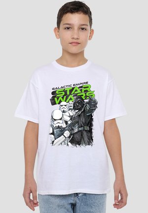 White cotton t-shirt featuring a graphic print of stormtroopers and Darth Vader in black and green against a textured background.