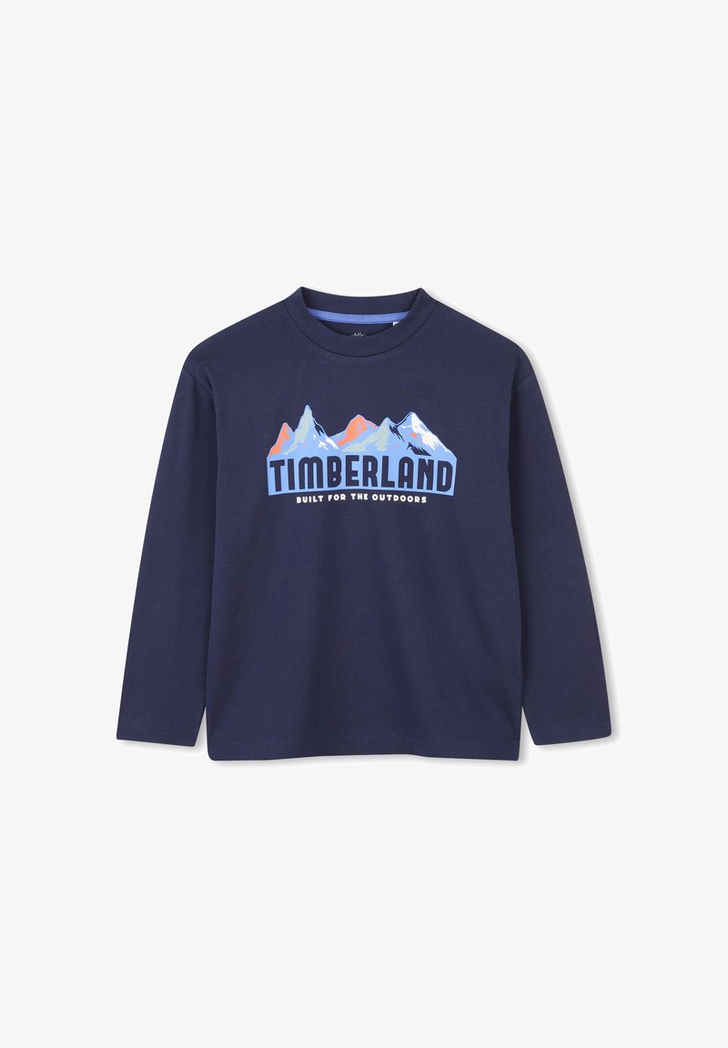 T-shirt de manga longa azul-marinho feito de algodão, com uma gráfica de montanha e o texto "TIMBERLAND" na frente. Design de gola redonda.