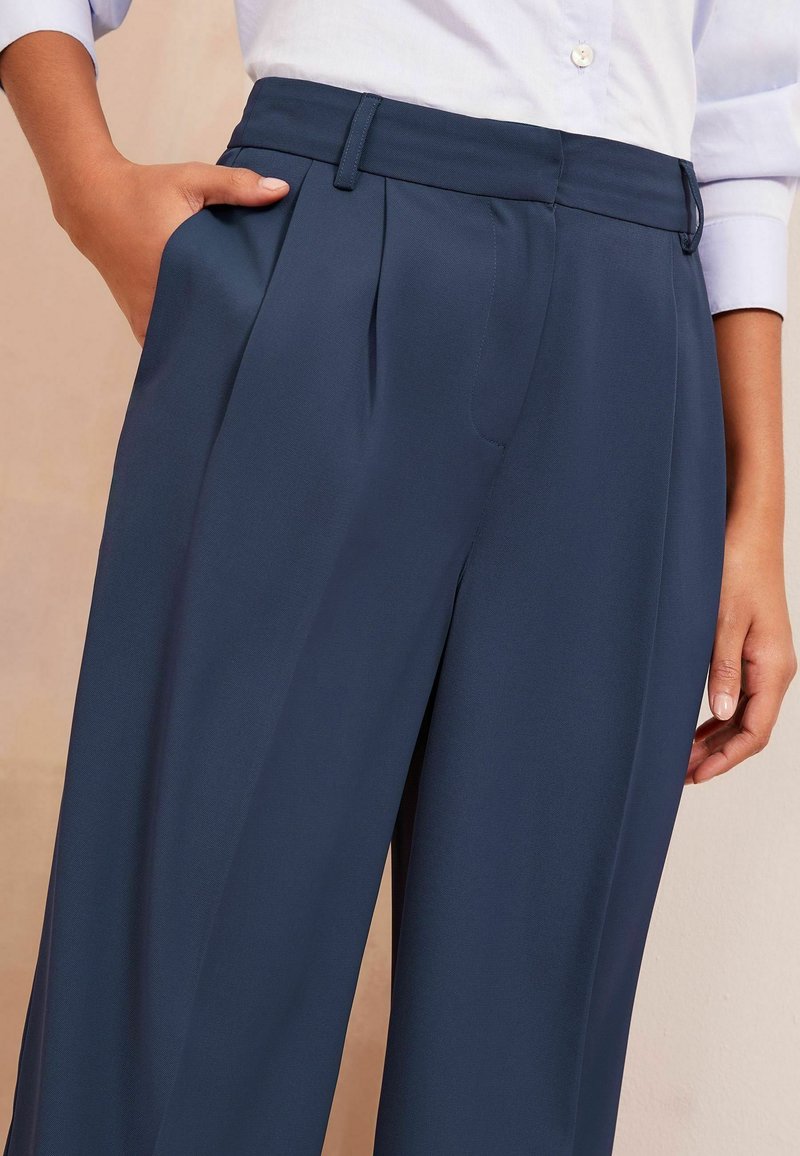 Friends Like These PETITE WIDE LEG Trousers navy/blue Zalando
