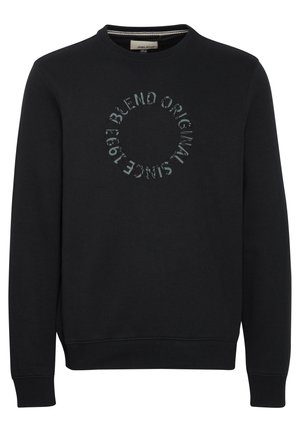 Fekete kereknyakú pulóver, pamutból készült, elől kör alakú szöveges grafikával. Rugalmas mandzsetták és szegély, sima tapintású.