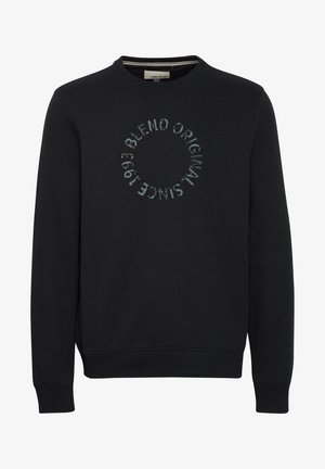 Fekete kereknyakú pulóver, pamutból készült, elől kör alakú szöveges grafikával. Rugalmas mandzsetták és szegély, sima tapintású.