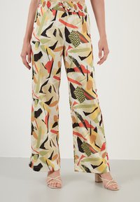 LELA LOOSE FIT - Trousers - yellow