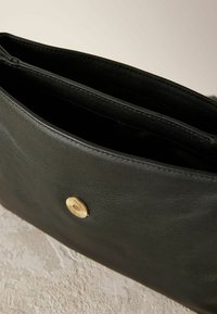 Next Geantă crossbody - black