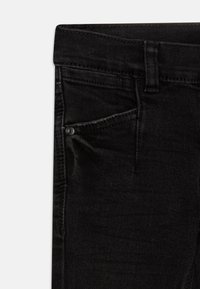 Name it NKFPOLLY  - Džíny Bootcut - black denim