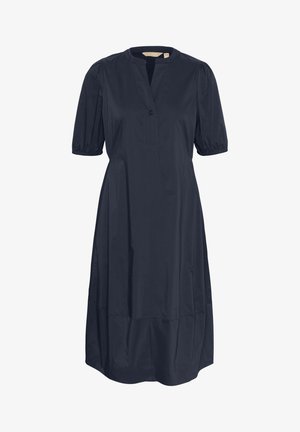 Marinblå klänning med avslappnad passform, korta puffärmar, v-ringning och en enkel knappstängning. Slätt tyg med knälång fåll.
