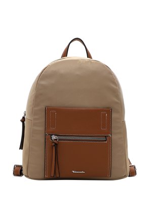 Beige canvas backpack with a brown leather front pocket. Features silver zipper and stitching details. Adjustable straps and top handle.
