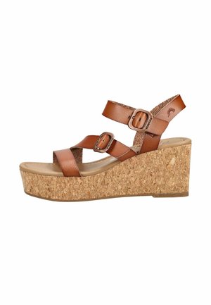 Brązowy skórzany sandał na koturnie z korkową platformą, dwoma regulowanymi paskami z klamrami i paskiem wokół kostki z małym logo.