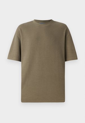Khaki prążkowany t-shirt z krótkim rękawem i okrągłym dekoltem, charakteryzujący się luźnym krojem i miękką fakturą, idealny do codziennych stylizacji.