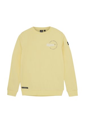 Gul sweatshirt med lange ærmer, rund halsudskæring og grafisk tekst på fronten. Har et mærke på den nederste kant. Blød tekstur.
