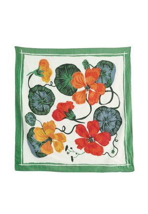 Tissu carré à bordure verte, décoré de grandes fleurs orange et jaunes, de feuilles vertes et de tiges noires enroulées sur fond blanc.