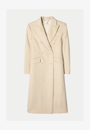 Long beige double-breasted wool coat with notch lapels, six buttons, flap pockets, and a single chest welt pocket.