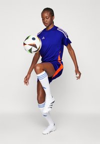adidas Performance TIRO 24 JUMPSUIT - Overal - lucid blue/app solar red