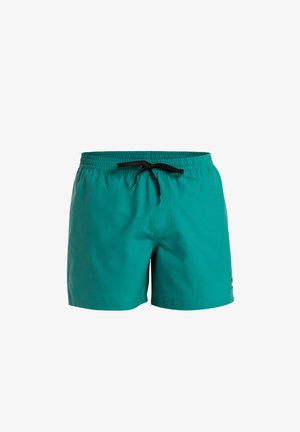 Turkoosi uimashortsit, jotka on valmistettu kevyestä materiaalista, joustavalla vyötärönauhoilla ja mustalla narulla. Sisältää pienen logon helmassa.