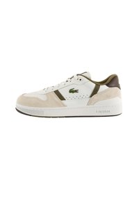 Sneaker bianca in pelle e suede con dettagli verde e marrone, caratterizzata da un design perforato, chiusura con lacci e suola texturizzata.