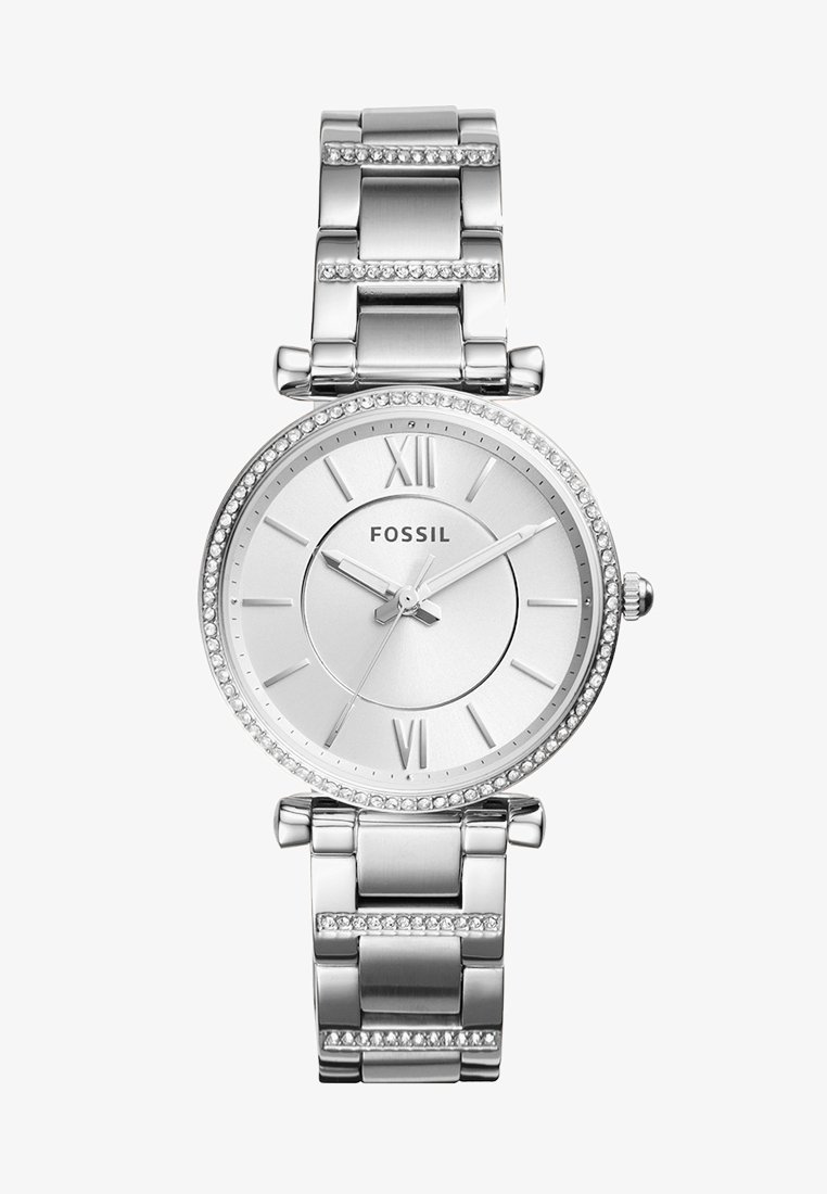 Orologio Fossil argento con quadrante rotondo, numeri romani e accenti in cristallo. Presenta un bracciale in metallo lucido con una chiusura coordinata.