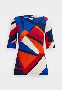 Blusa de manga corta multicolor de algodón, con patrones geométricos en azul, rojo, naranja y crema, de cuello redondo y mangas con puños.