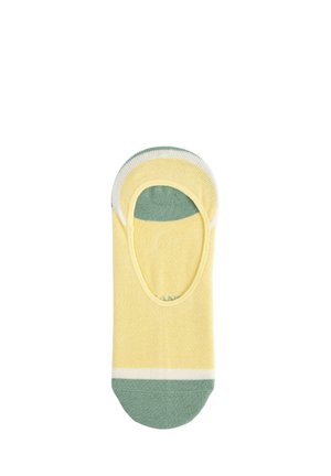 Calcetín invisible individual con cuerpo amarillo, puntera y talón verdes, y ribete blanco, colocado plano sobre un fondo blanco.
