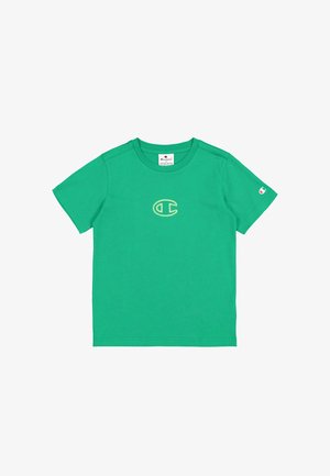 Zielona koszulka z krótkim rękawem, wykonana z bawełny, z małym haftowanym żółtym logo na klatce piersiowej i naszywką z logo na rękawie.