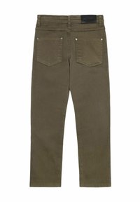 Olivgrön, åtsittande jeans gjorda av denim. Funktioner inkluderar två bakfickor med metallaccenter och en svart midjebandsmärkning. Slät textur.