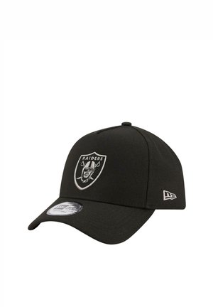 Black baseball cap with embroidered Raiders logo on front, adjustable strap, smooth fabric texture, and curved brim. New Era branding on side.