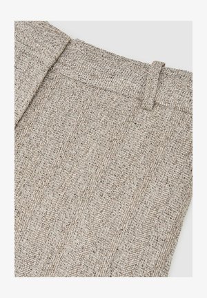 Heringbone-Musterstoff in Beige- und Grautönen mit strukturiertem Bund und kunstvollem Webmuster.