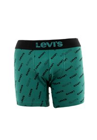 Bóxer de algodón verde con cinturilla negra, que presenta el logotipo "Levi's" en colores contrastantes, textura suave y diseño ajustado.
