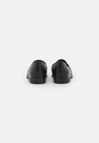 Jana Slip-ons - black