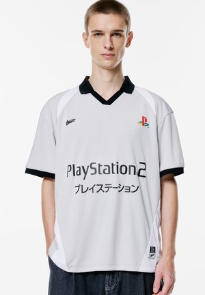 Light gray PlayStation 2 jersey with black collar and accents, featuring black text and logos in front, soft fabric with a relaxed fit.