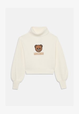 Jersey recortado color crema con cuello alto, que presenta un oso de peluche marrón bordado y el texto "Moschino" debajo del diseño. Material de punto texturizado.