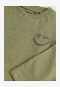 Niet geselecteerd, khaki green smile