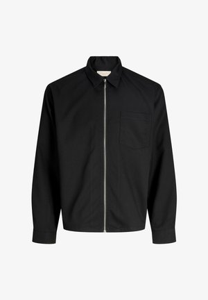 Črna jakna z zadrgo spredaj, ovratnikom in enim žepom na prsih. Iz teksturiranega blaga z dolgimi rokavi in ravnim krojem.