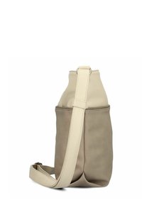 Zweifarbige beige Leder-Umhängetasche mit verstellbarem Riemen, aufrecht stehend vor weißem Hintergrund.