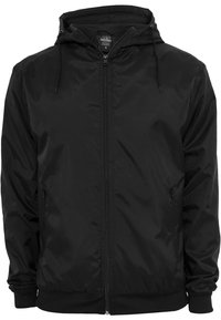 Black windbreaker jacket made of smooth fabric, featuring a hood, front zipper, and elastic cuffs and hem. Two side pockets included.