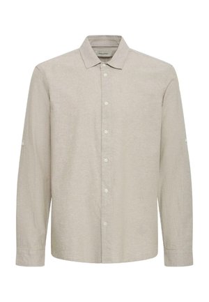 Chemise beige à manches longues avec col, boutonnée sur le devant, avec des boutons aux poignets et un tissu uni texturé.