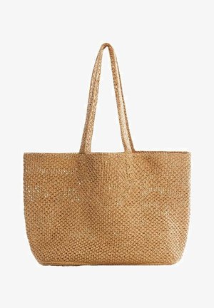 Tkaná slámová taška v světlém tanovém odstínu, vybavená dvěma dlouhými uchy a otevřeným designem. Texturovaný povrch s jemnými vzory.