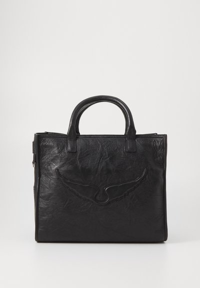 Black leather bag with two rounded handles, a textured surface, and a prominent logo embossed on the front. Zip closure at the top.