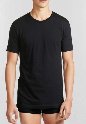 T-shirt nera a maniche corte in cotone liscio; presenta una scollatura tonda e una vestibilità standard, senza motivi o decorazioni visibili.