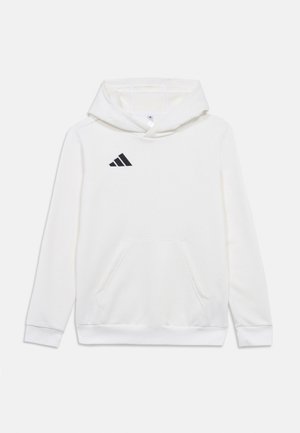 Hvit hettegenser med frontlomme, snøring i hetten og svart Adidas-logo på brystet. Laget av myk, strukturert stoff.