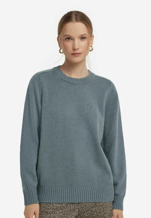 Stickad tröja - light blue