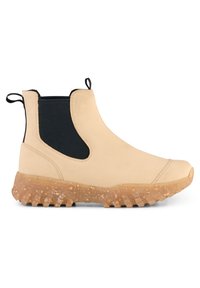 Beige chelsea stövletter med svarta elastiska sidor, texturerad gummisula och dragflikar. Slät yta med rundad tå och robust konstruktion.