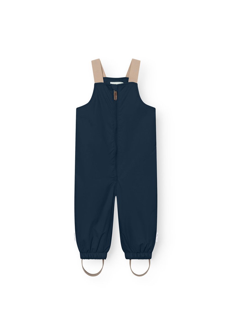 Navy blue waterproof overall with beige straps, front zipper closure, elastic cuffs, and circular hardware accents at the ankles.