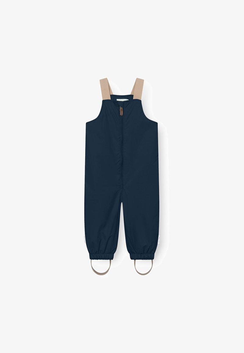 Navy blue waterproof overall with beige straps, front zipper closure, elastic cuffs, and circular hardware accents at the ankles.