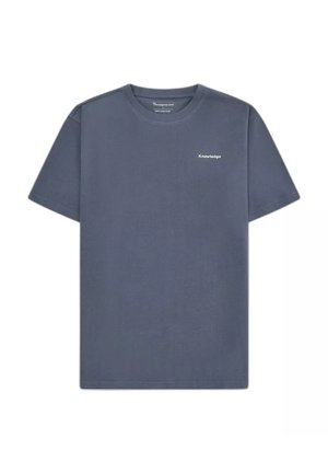 Donkergrijs katoenen T-shirt met korte mouwen, ronde hals en kleine witte tekst "Knowledge" op de linkerborst.