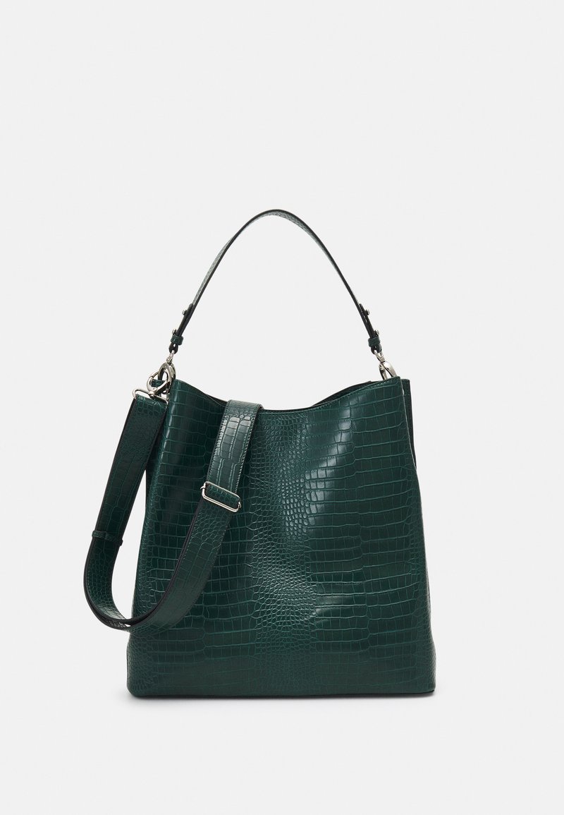 Green crocodile-patterned leather handbag with a single top handle and an adjustable shoulder strap. Glossy finish and spacious interior.