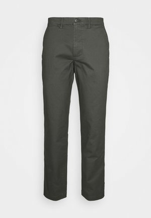 Dark green cotton trousers with a flat front, straight leg design, and a button closure; minimal detailing with side pockets.